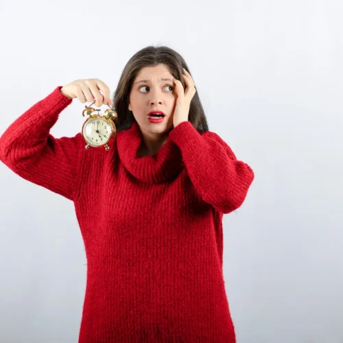 What causes us to wake up before our alarms?